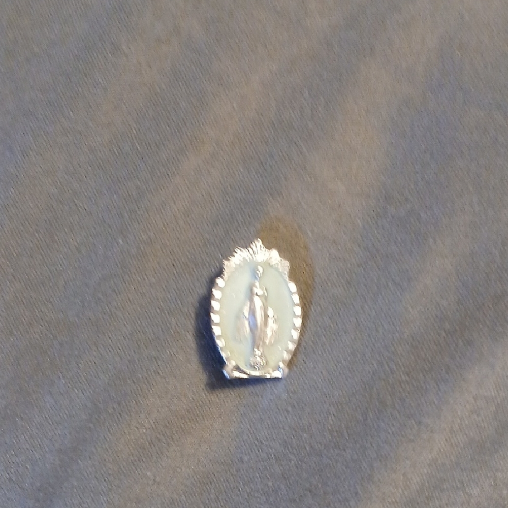 Graceful Silver Religious Brooch